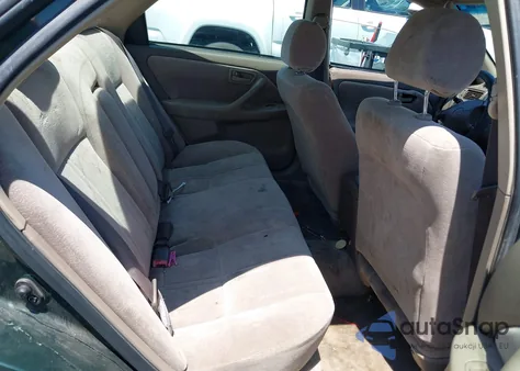 1999 Toyota Camry Le from USA, damaged, VIN 4T1BG22KXXU888043